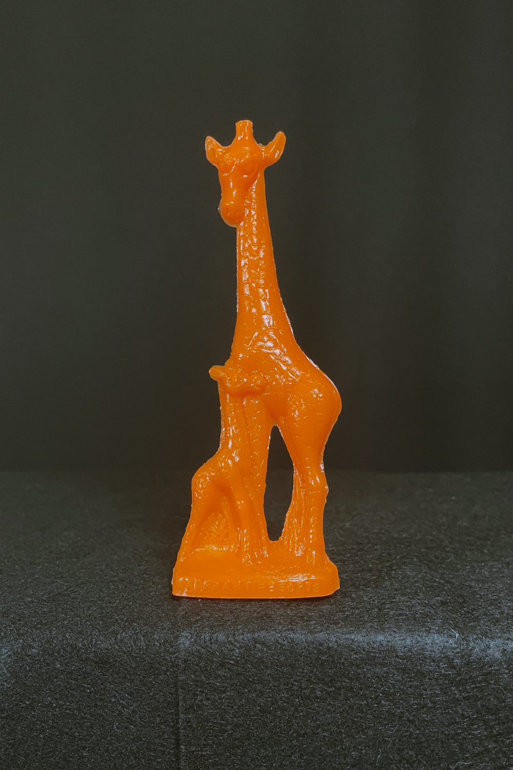 Orange Mold-A-Rama Giraffe Figurine from Wisconsin Dells Kalahari Resort