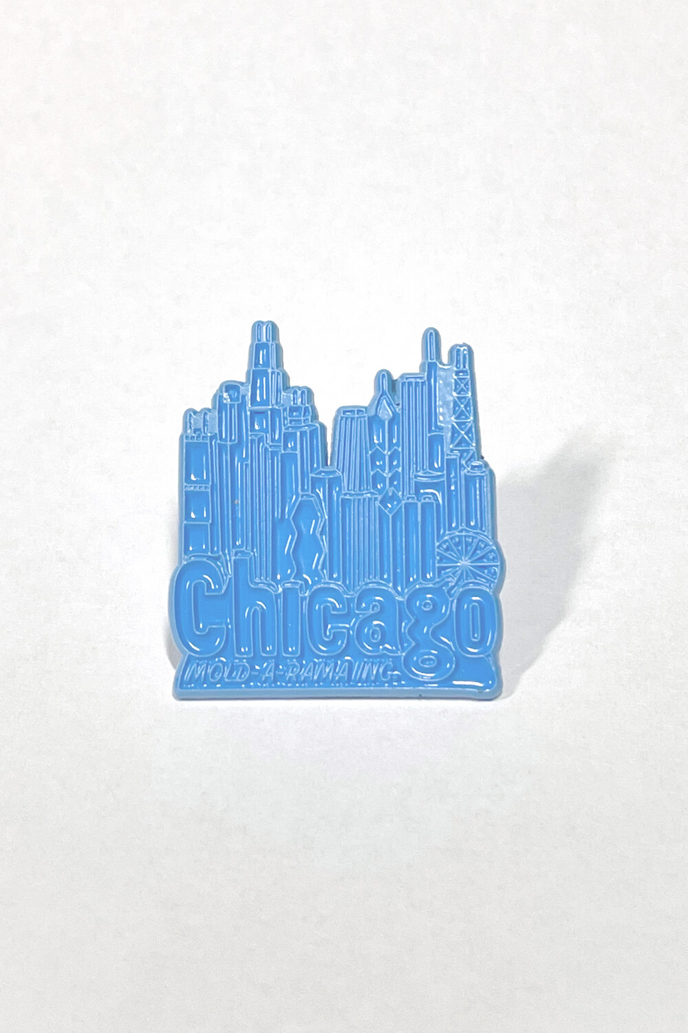 Front of Mold-A-Rama Chicago Skyline Soft Enamel Pin