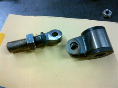 Tabs welded to urethane bushing outer sleeve.