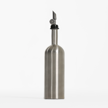 Stainless steel bottle with self-closing pour spout