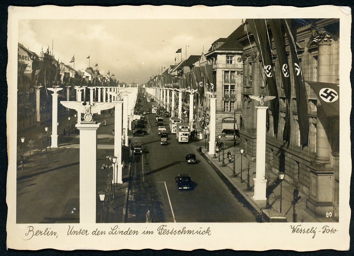 FACEBOOK AUCTION - German Third Reich Photo Postcard Berlin Unter Den Linden, Many Swaz Flags + Large Eagle Swaz Poles Lining The Street