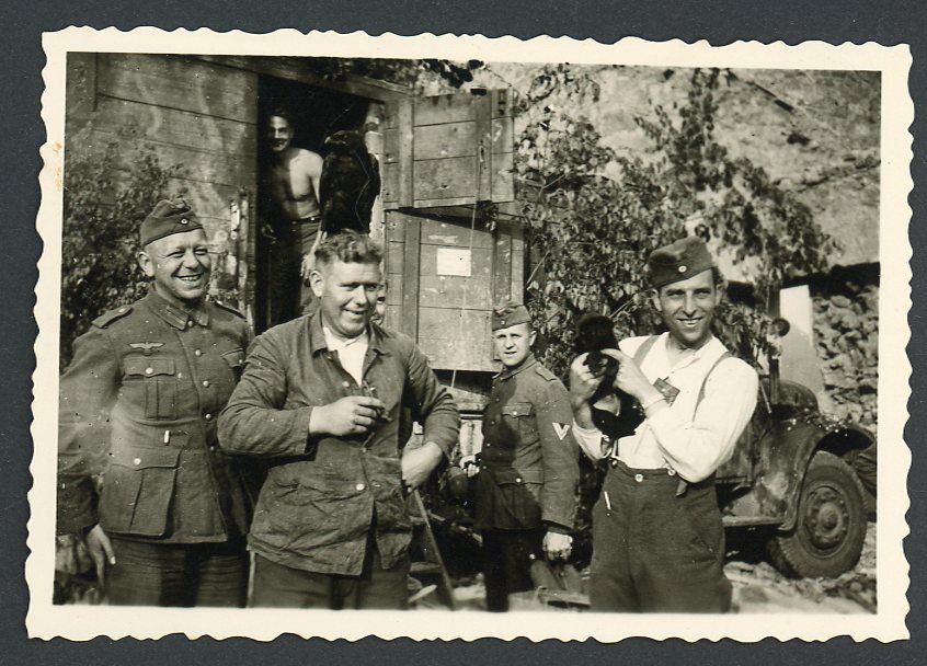 German WW2 Photo - Wehrmacht Soldiers Pose w/ Company Mascot Puppy Dog Named Jakob