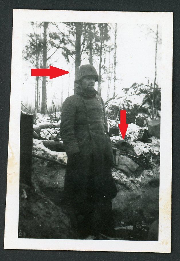 German WW2 Photo - Wehrmacht Soldier w/ Cloth Helmet Cover, MP40 Nearby - Snow Covered Fighting Position
