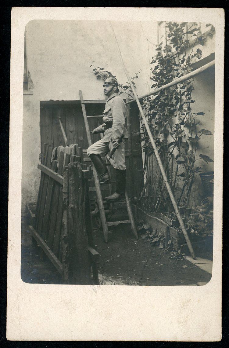 Imperial German Photo of Fireman In Helmet Holding Axe On Ladder