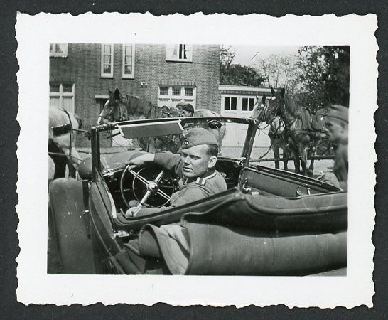 German WW2 Photo - Wehrmacht NCO Driver Looks At Camera With His Biff Tannen What Are Lookin At Butthead Pose!