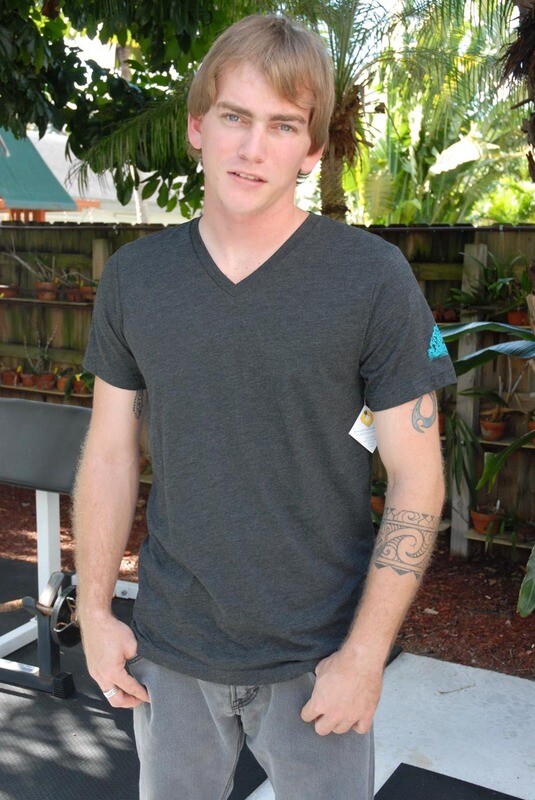 Men's Charcoal V Neck with Wave Art in Turquoise sleeve