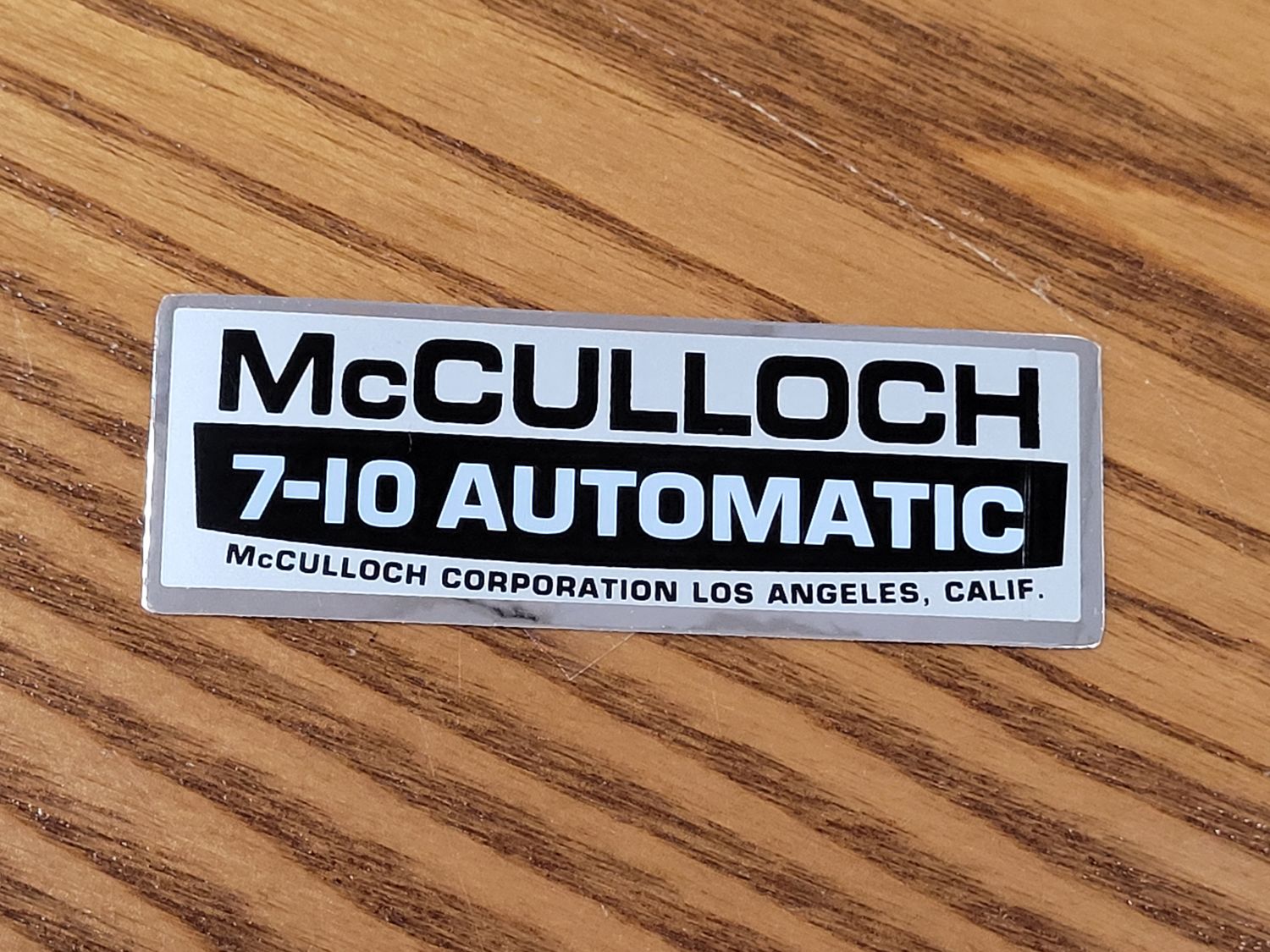 McCulloch 7-10 Automatic Silver, Black, and White filter cover sticker