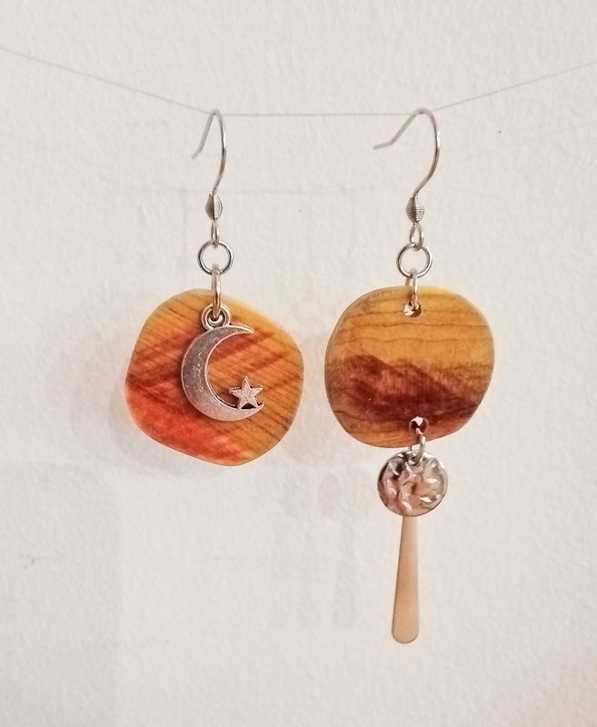 Boucles d'oreilles asymétriques