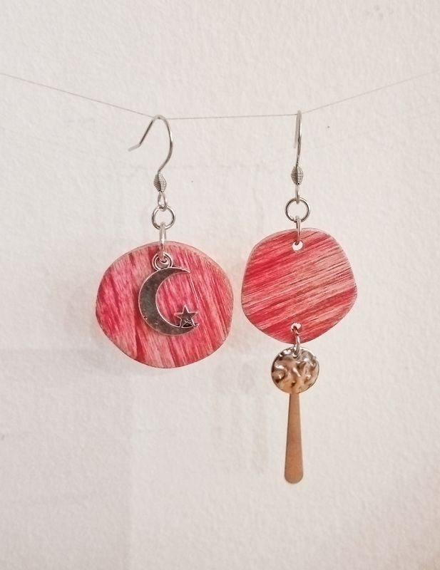 Boucles d'oreilles asymétriques