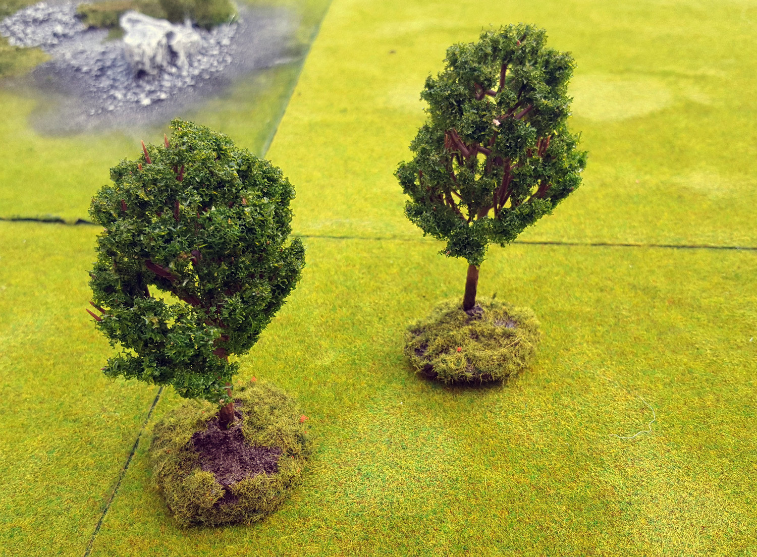 Trees used on a 6x4 board - rest of the terrain and miniatures shown for scale and display purposes only