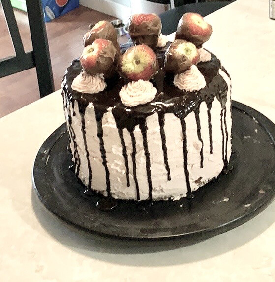 Vanilla With A Chocolate Drizzle And Fresh Strawberry Topping