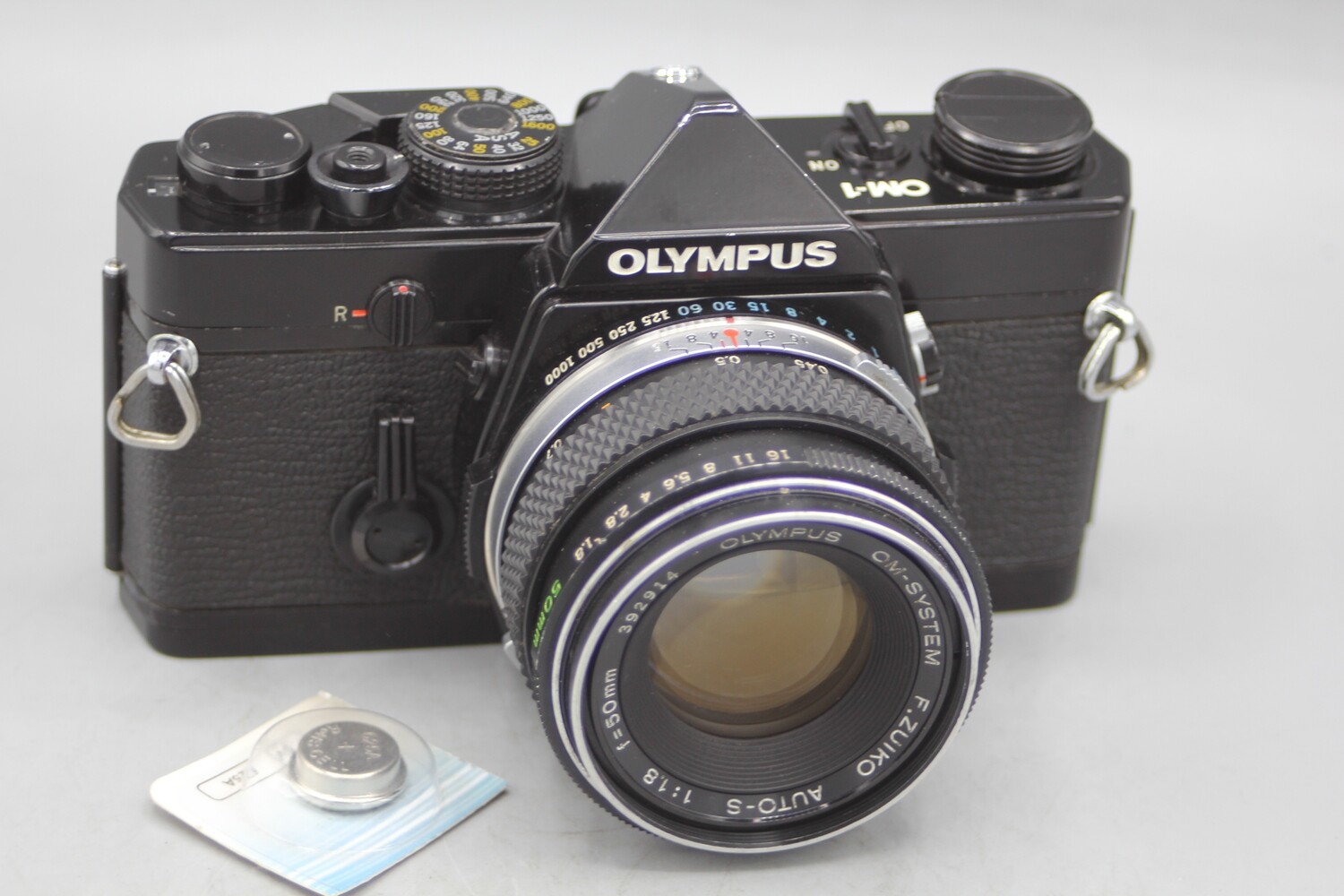 Olympus OM-1 35mm Film Camera w 1.8/50 Lens Clad Seals Tested