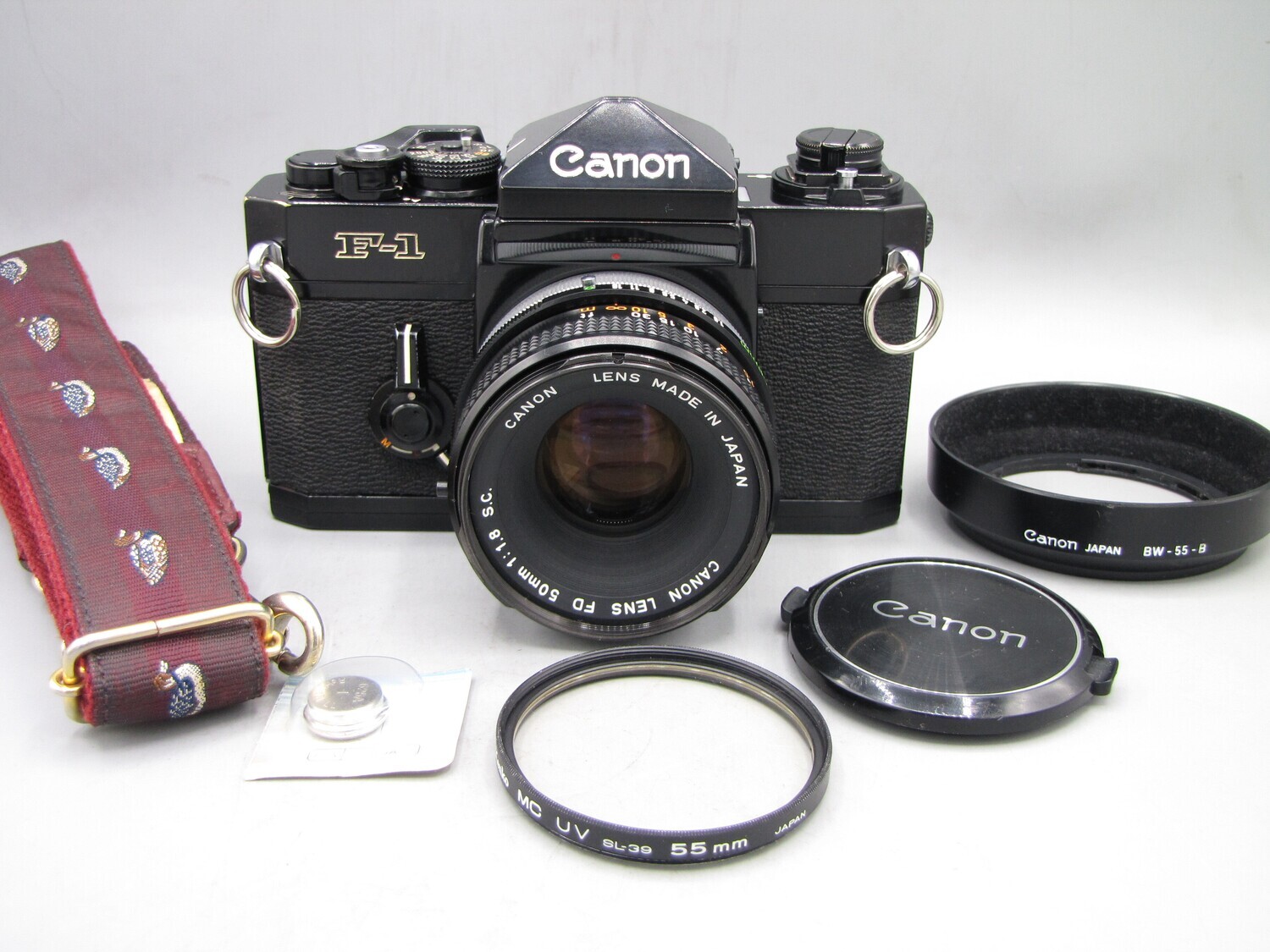 Canon F-1 35mm SLR Camera w 1.8/50 Clad Seals Battery Tested