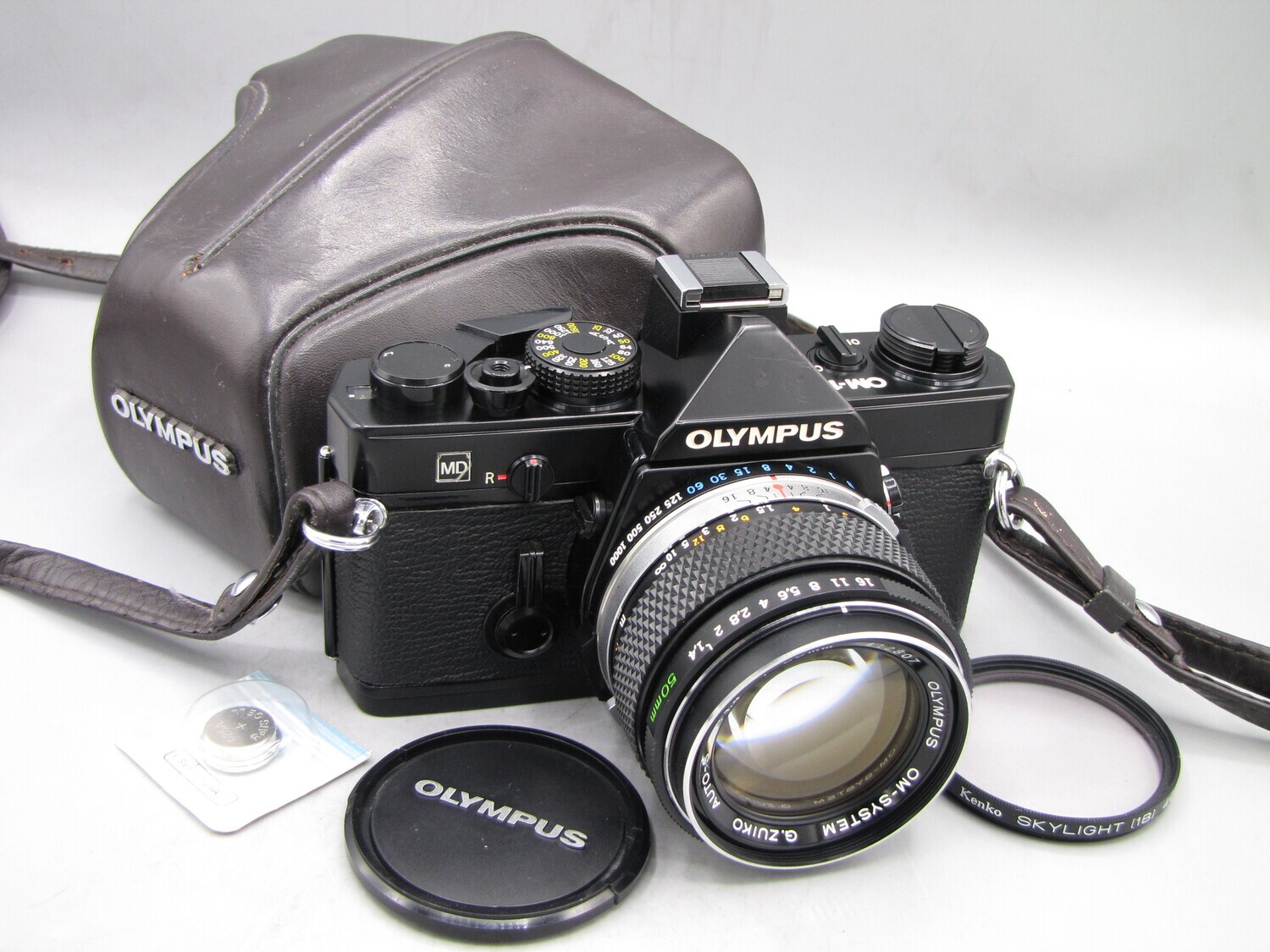 Olympus OM1 35mm SLR Camera w 1:1.4/50 Clad Seals Battery Tested