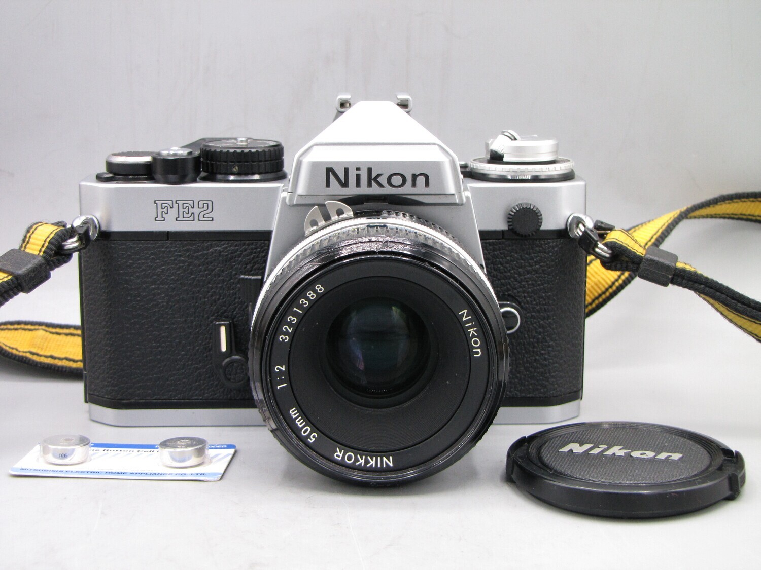Nikon FE2 35mm SLR Camera w 1:2/50 Clad Seals Battery Tested
