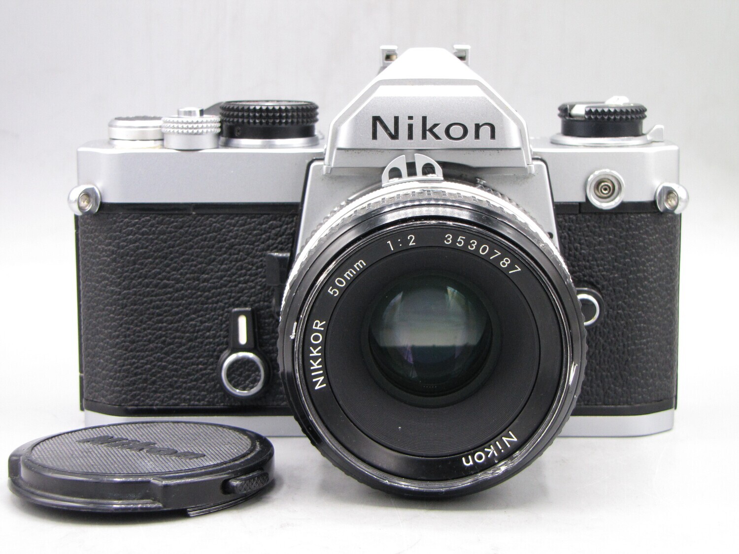 Nikon FM 35mm SLR Camera w 1:2/50 Clad Seals Battery Tested - As Is
