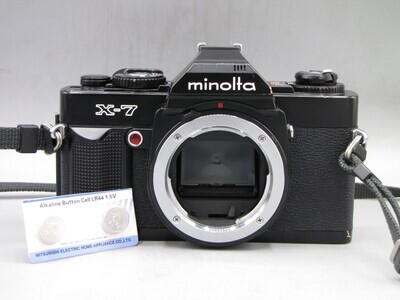 Minolta X-7 35mm SLR Camera Body Clad Seals Battery Tested
