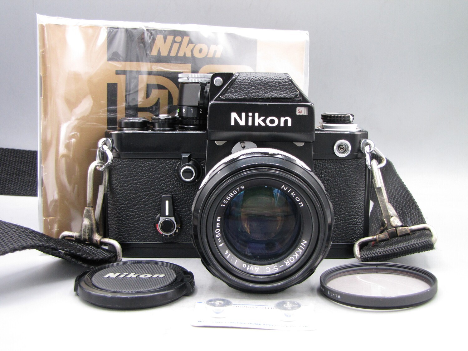 Nikon F2 35mm SLR Camera w 1.4 Lens Clad Seals Battery Tested