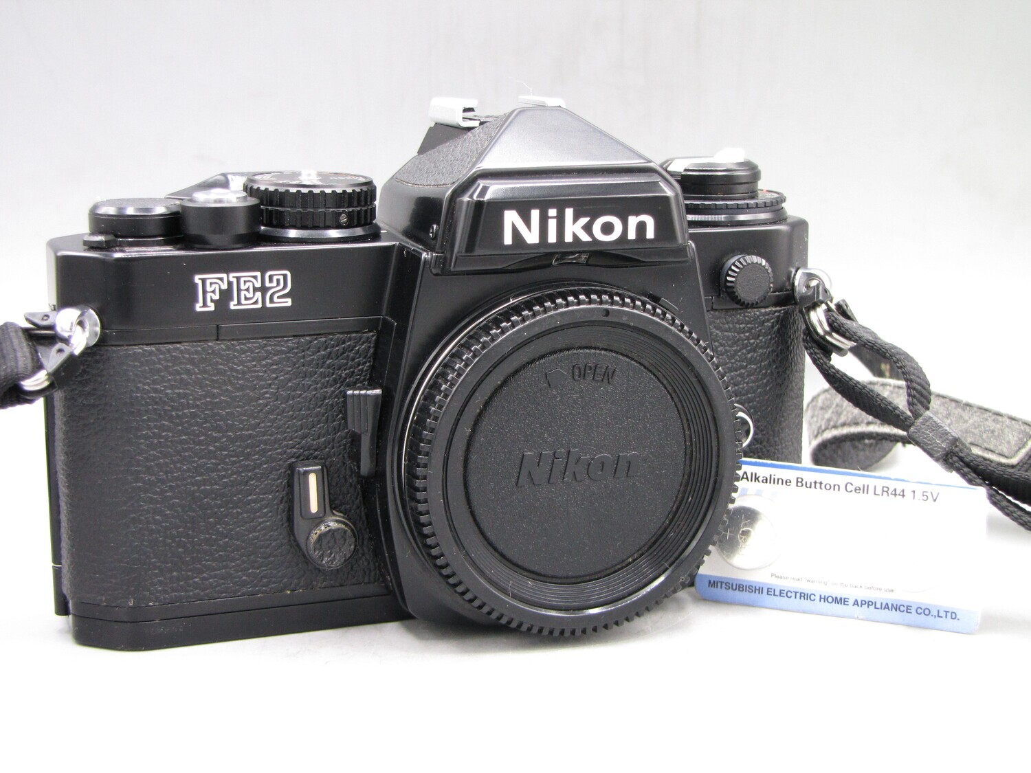 Nikon FE2 35mm SLR Camera Body Clad Seals Film Tested