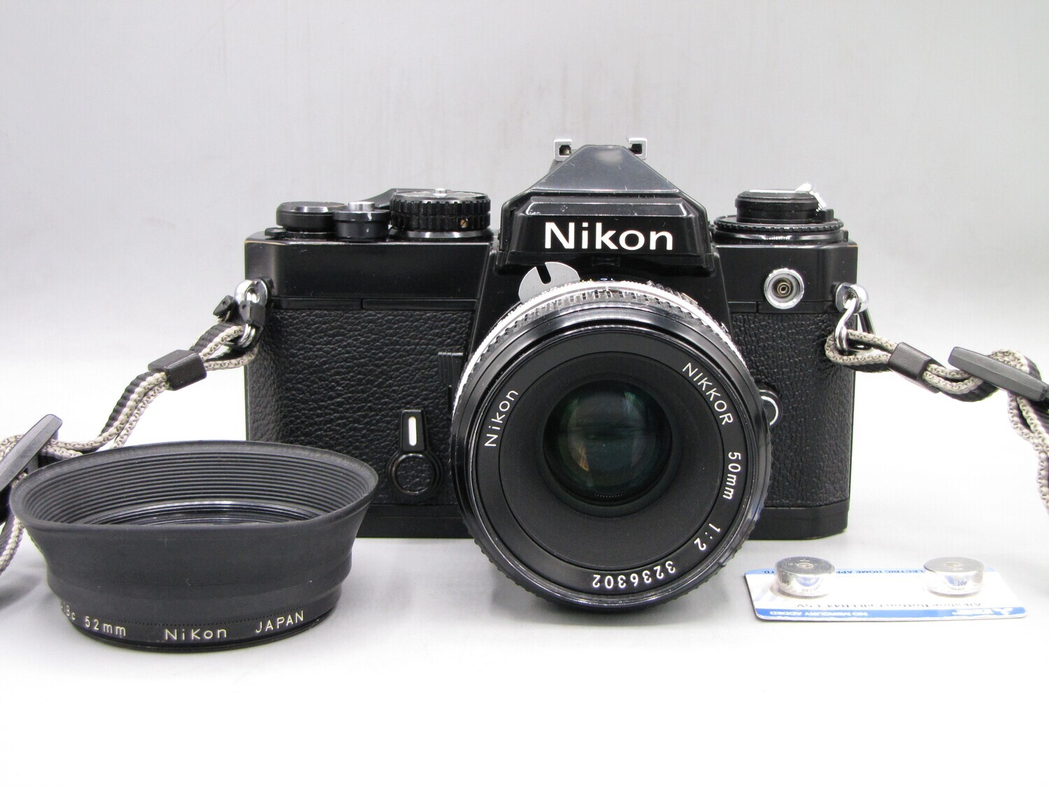 Nikon FE 35mm SLR Camera w 1:2/50 Clad Seals Tested