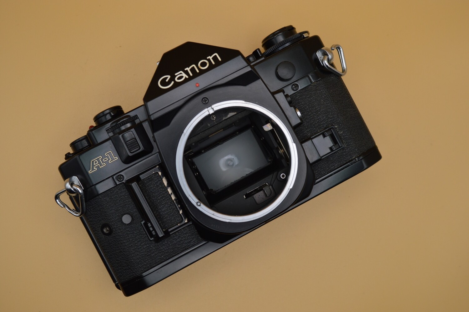 Canon A-1 SLR 35mm camera body for parts or repairs