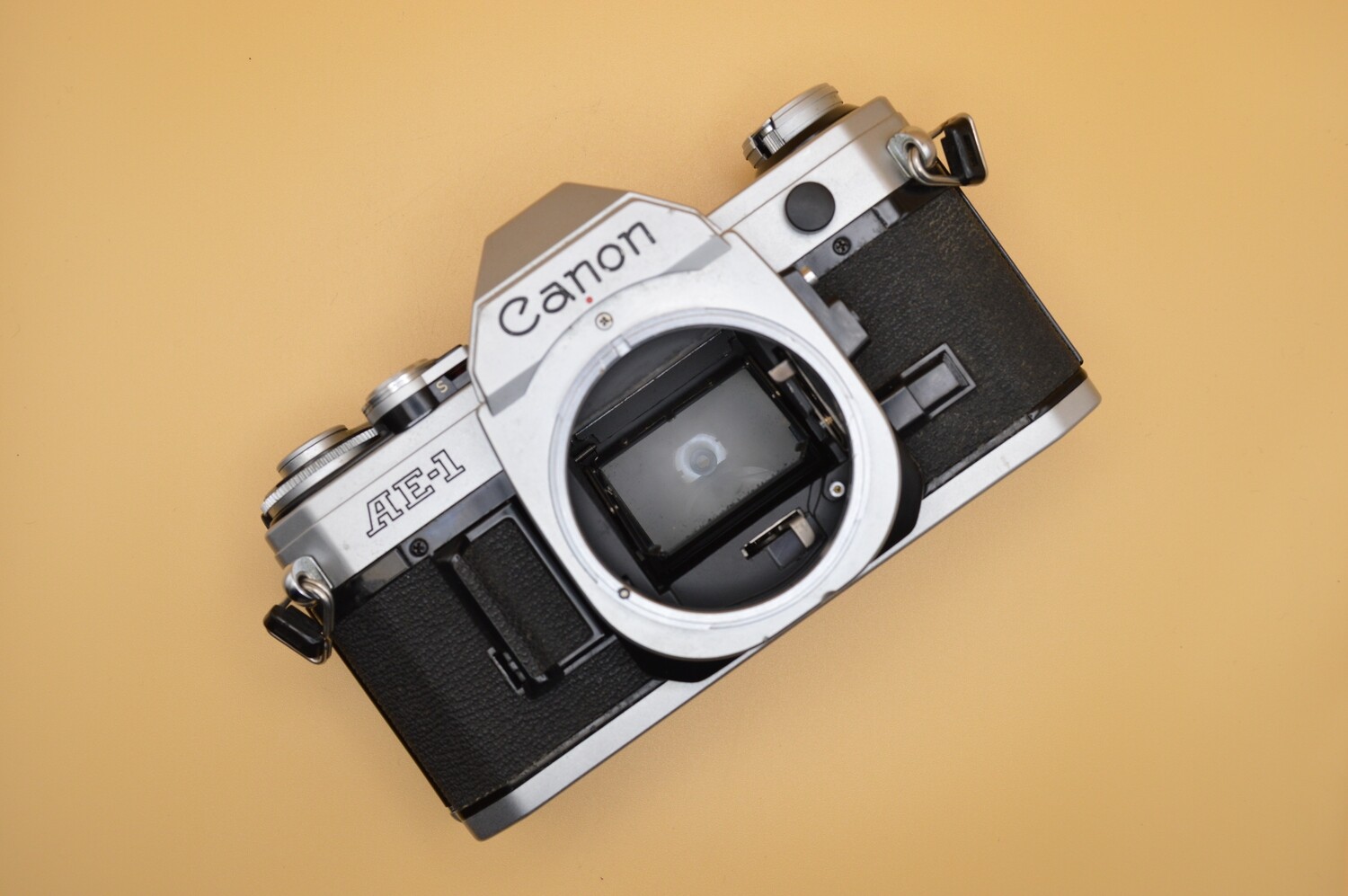 Canon AE-1 SLR 35mm camera body for parts or repairs