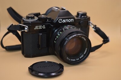 Canon AE-1 35mm Film Camera w 1.4/50 Clad Seals - Read