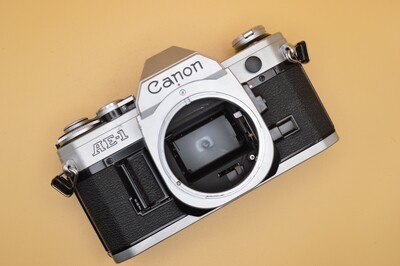Canon AE-1 SLR 35mm camera body for parts or repairs