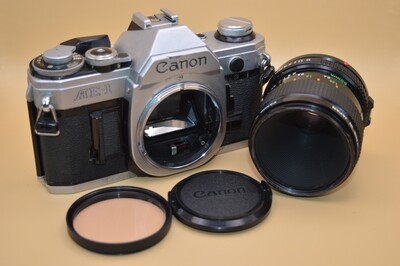 Vintage Canon AE1 SLR 35mm Film Camera with Zoom Lens
