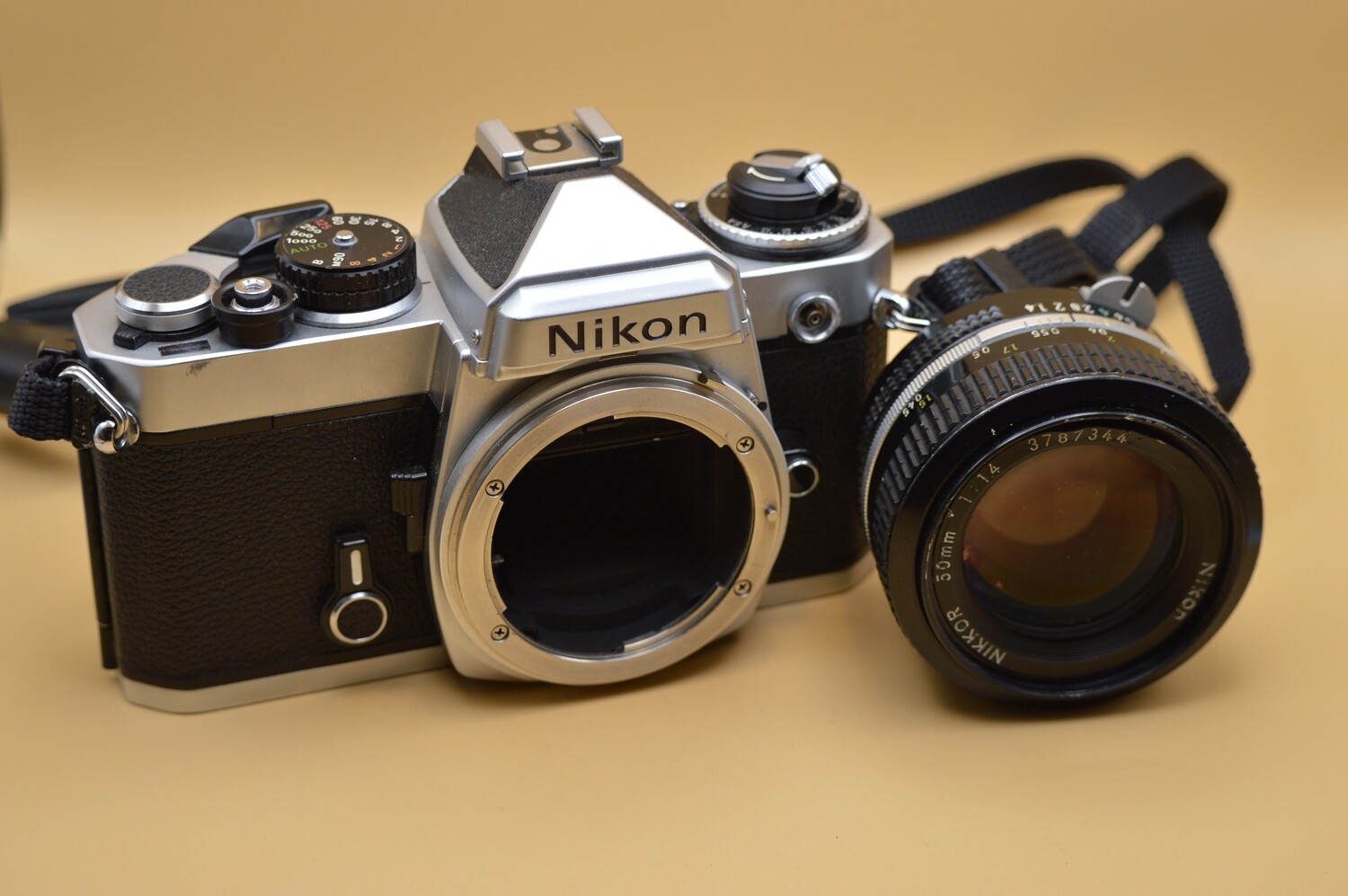 Nikon FE 35mm SLR camera body for parts as is sale