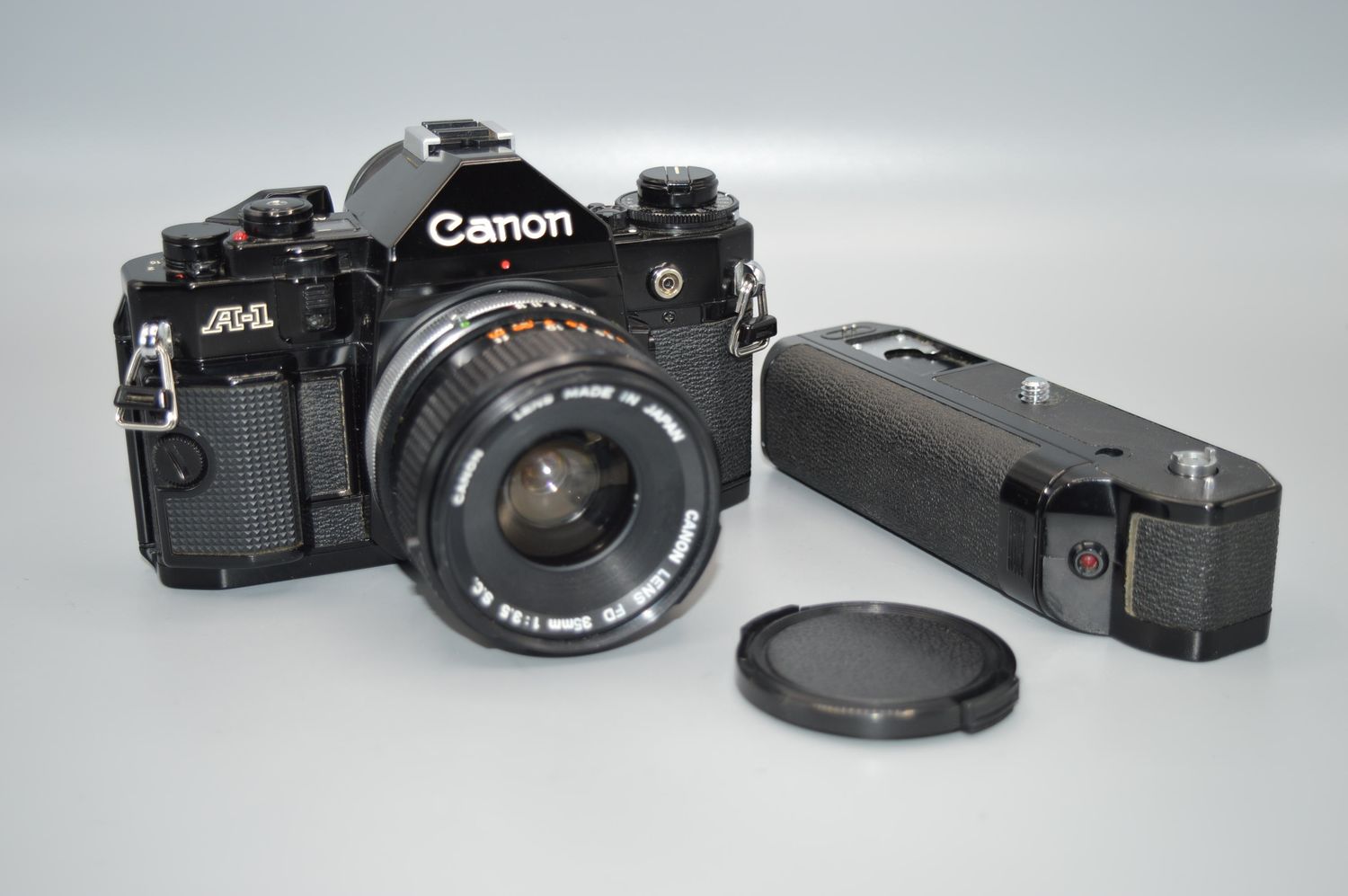 Vintage Canon A1 35mm SLR film camera with motor drive &amp; with FD Lens