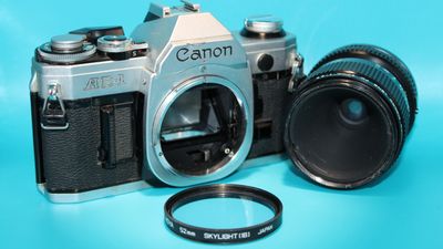 Vintage Canon AE1 SLR 35mm Film Camera with Zoom Lens