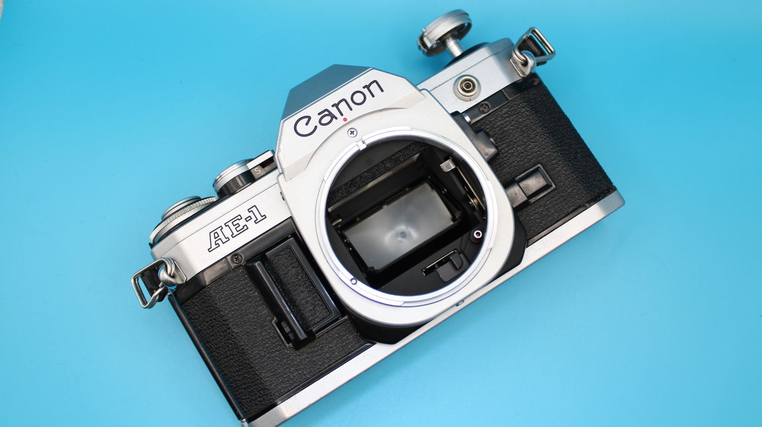 Canon AE-1 SLR 35mm camera body for parts or repairs