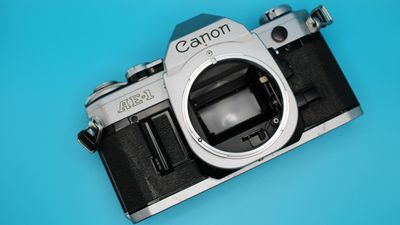 Canon AE-1 SLR 35mm camera body for parts or repairs