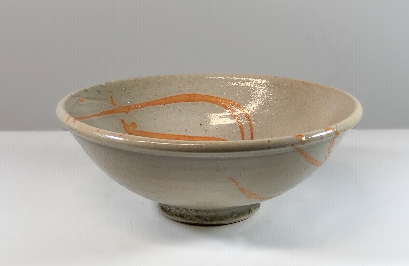 Beige Bowl with Orange Lines