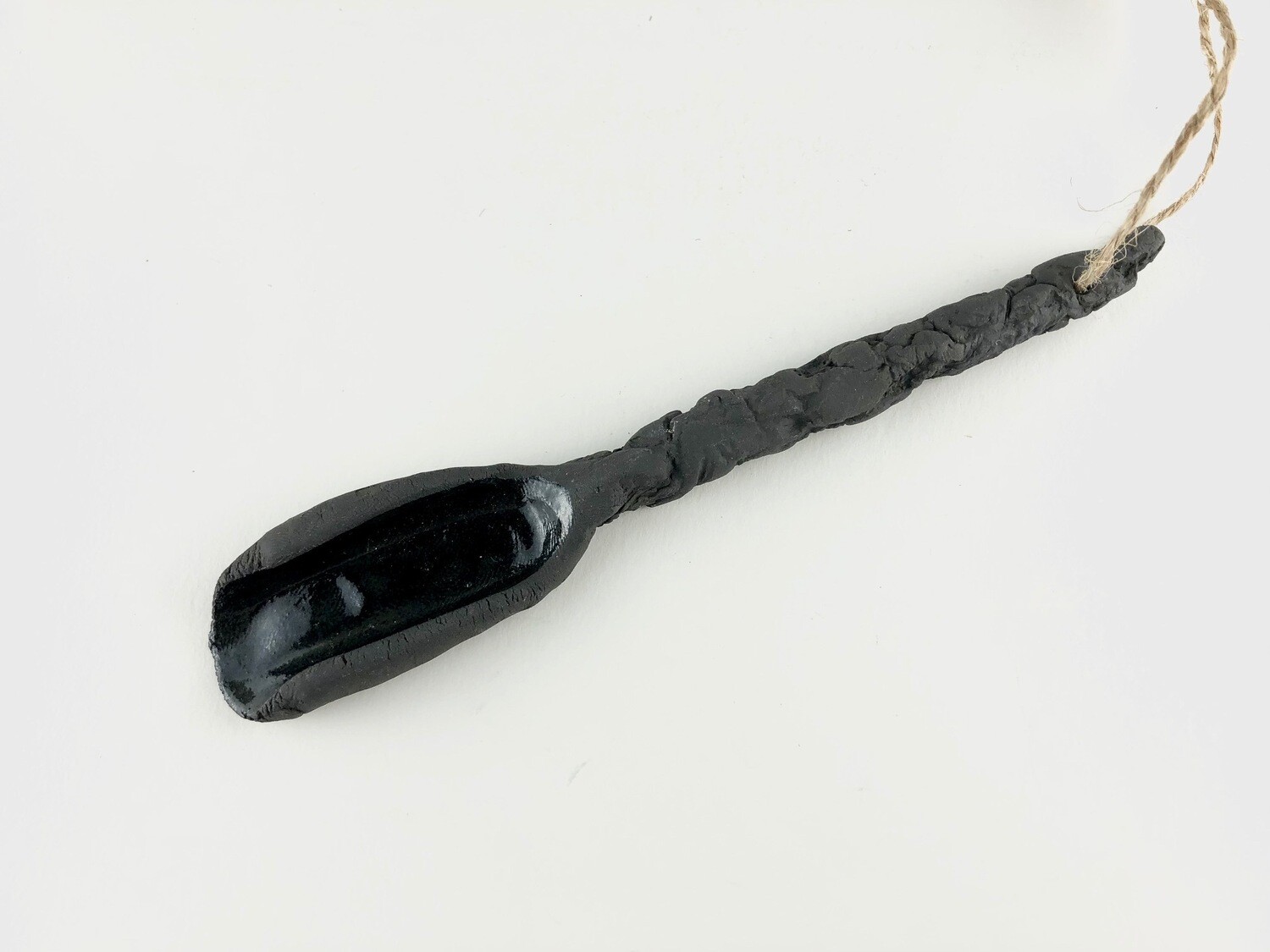 Black Spoon With Twisted Handle