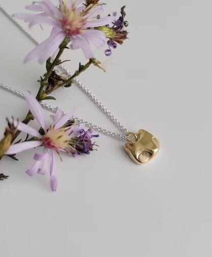 Bronze Raccoon Pendant on Silver Chain
