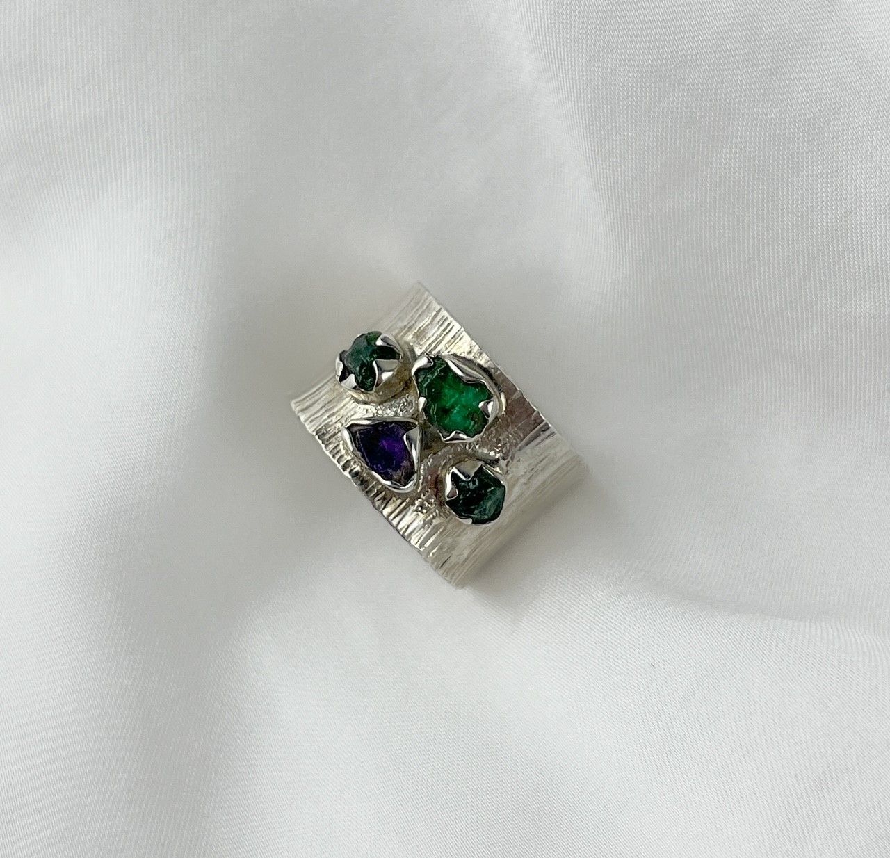 Ring 11mm Band with 3 Emerald and 1 Amethyst Size 6 SS
