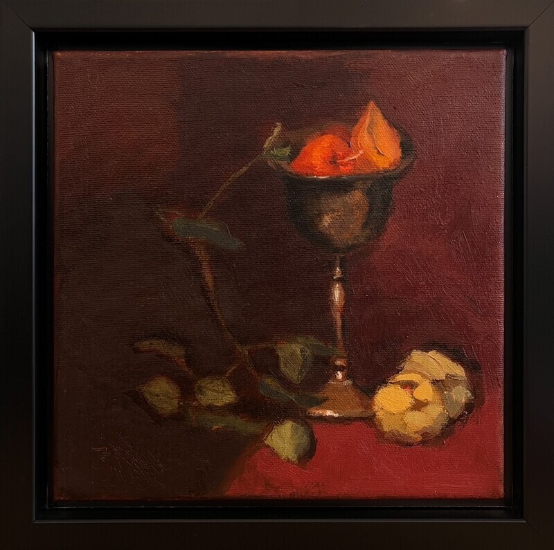 Gold Chalice with Dried Floral Leaves and a Dark red background