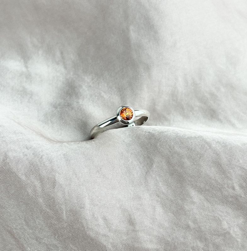 Sterling Silver Ring with Orange Topaz Stone