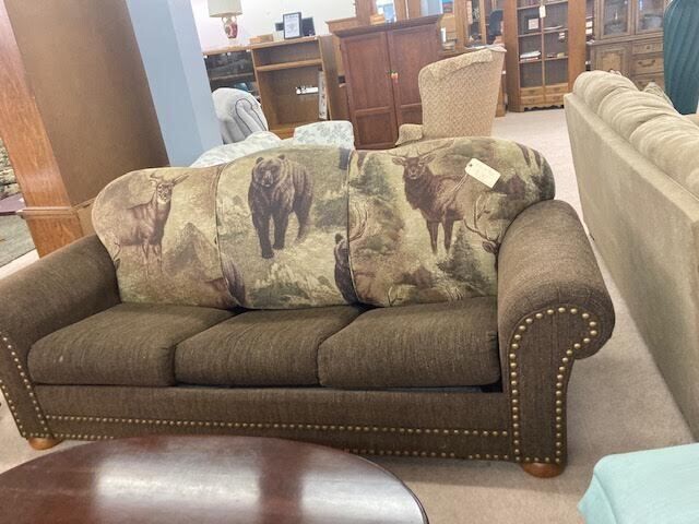 Brown sofa (hide a bed) with hunter style animal print