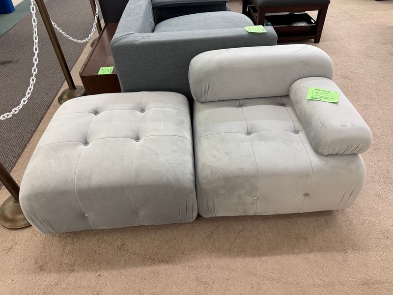 Gray velvet corner chair with ottoman
