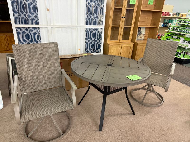 Round patio table with 2 swivel chairs