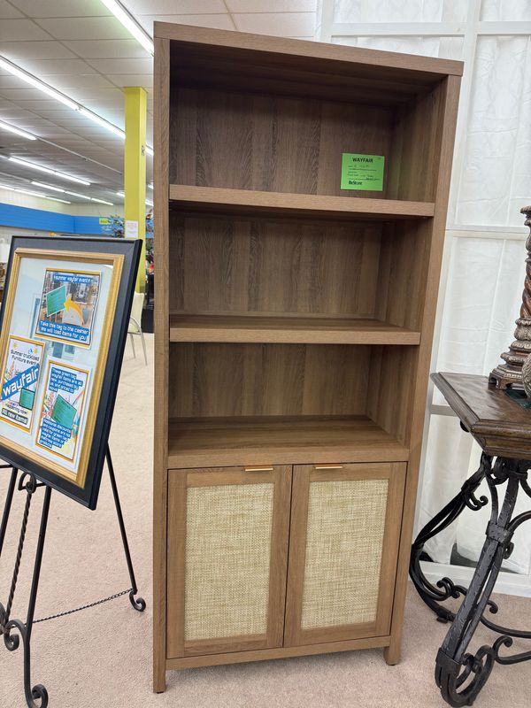 Bookcase with rattan cabinet fronts