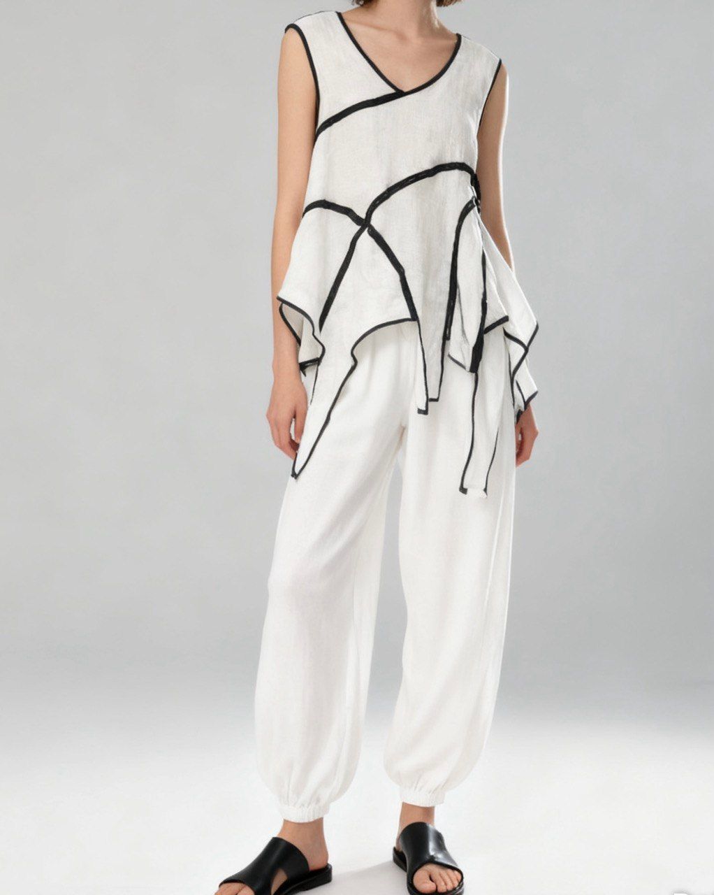 White V-Neck Draped Tunic with Bold Black Contrast Trim