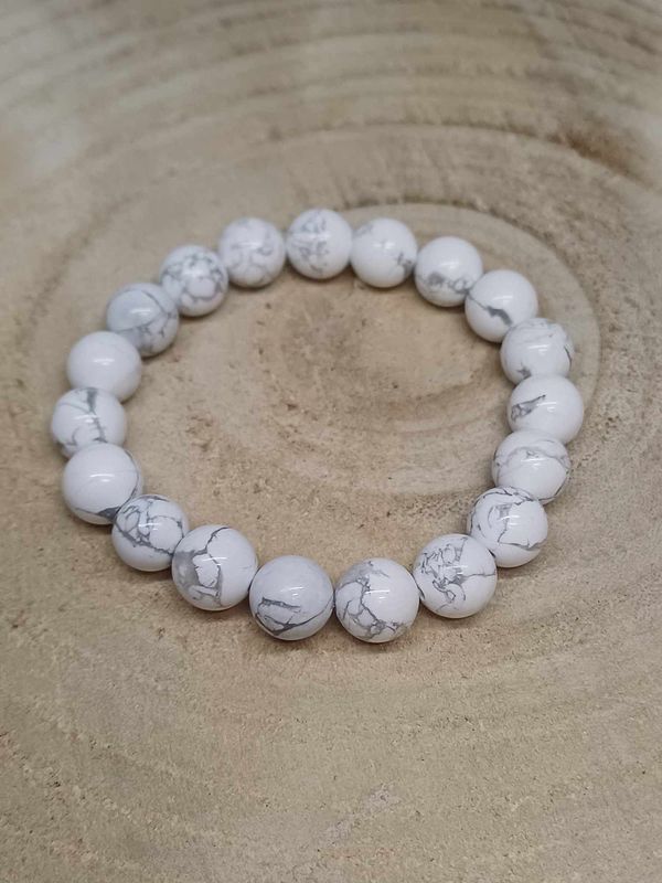 HOWLITE BLANCHE A ​​​ ​bracelet élastique, perles 10mm, dimension 17cm