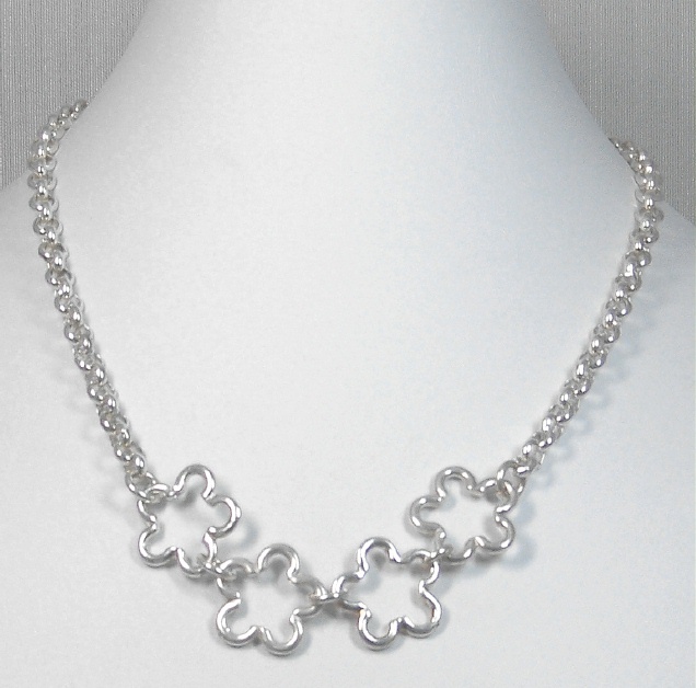 Silver chain with flower components