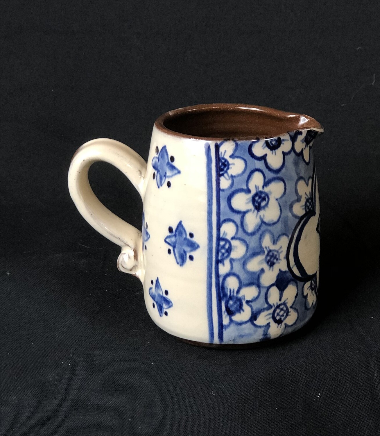 Blue and white bird jug