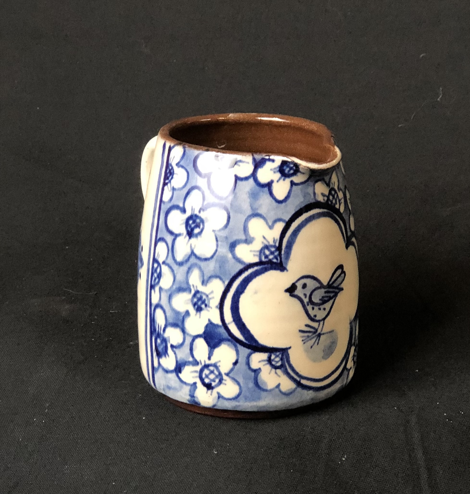 Blue and white bird jug