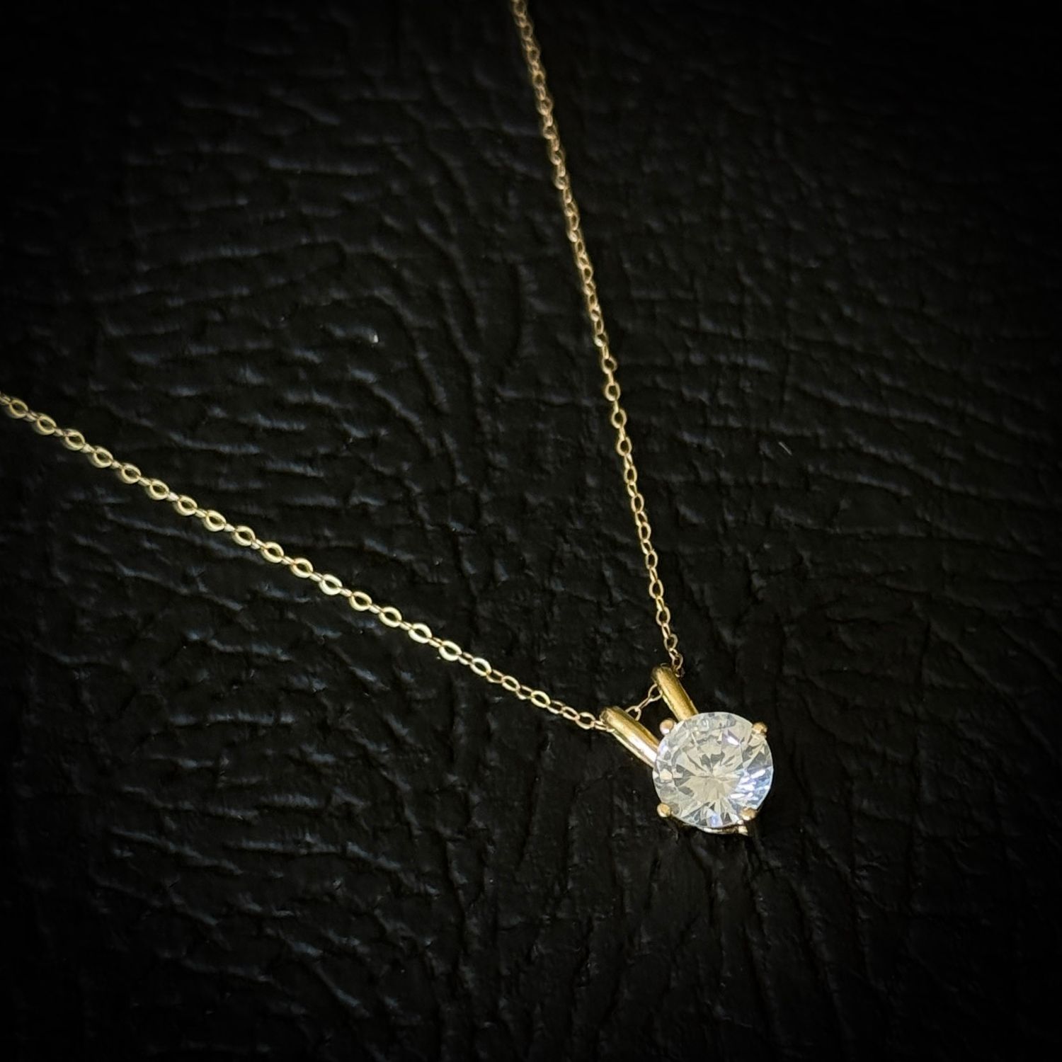 Dije PUNTO DE LUZ oro 18k 